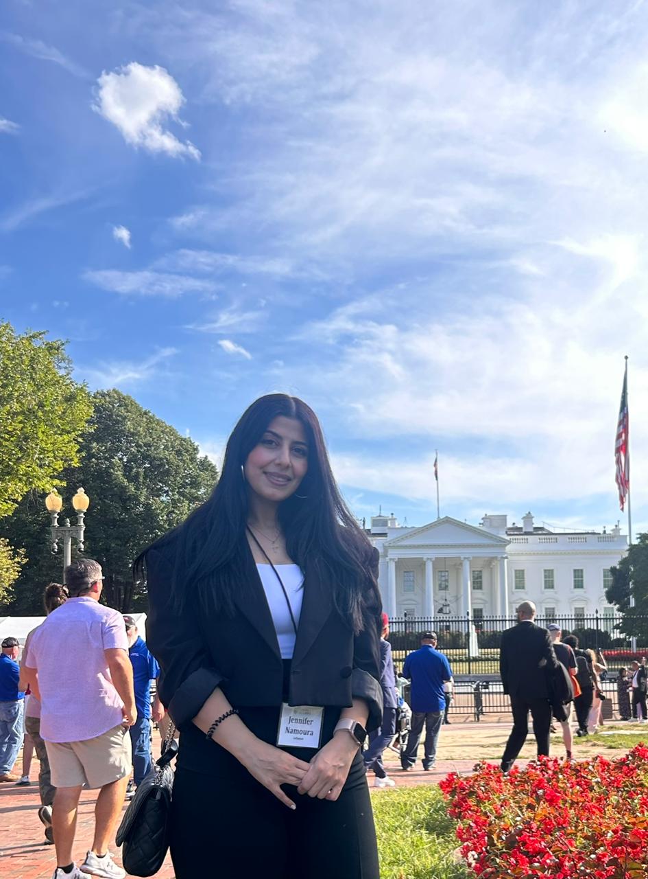 Jennifer Namoura poses in front of the White House